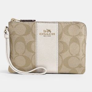 Coach Corner Zip Wristlet In Signature Canvas